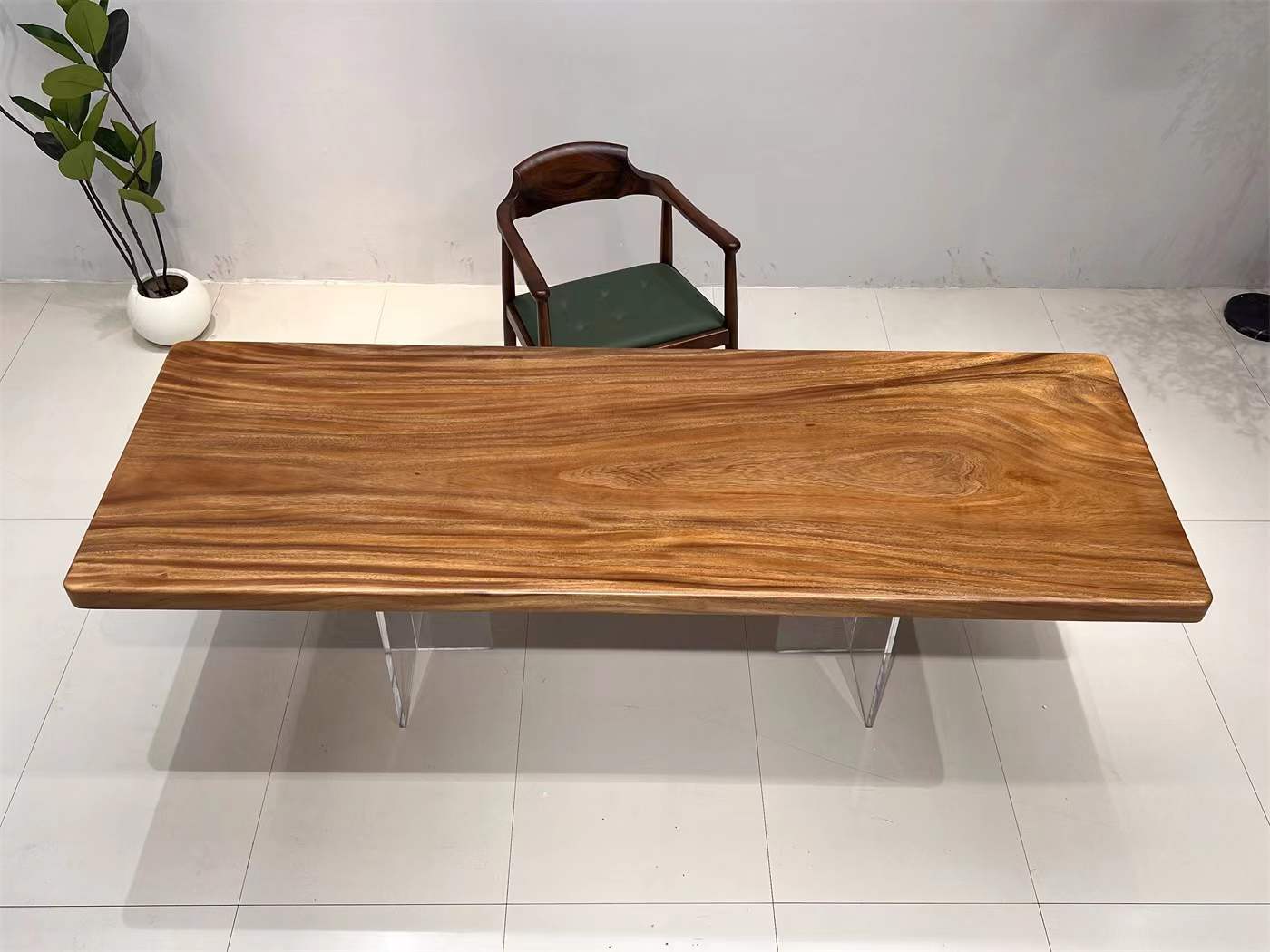 Modern Wooden Table with Acrylic Legs in Minimalist Setting